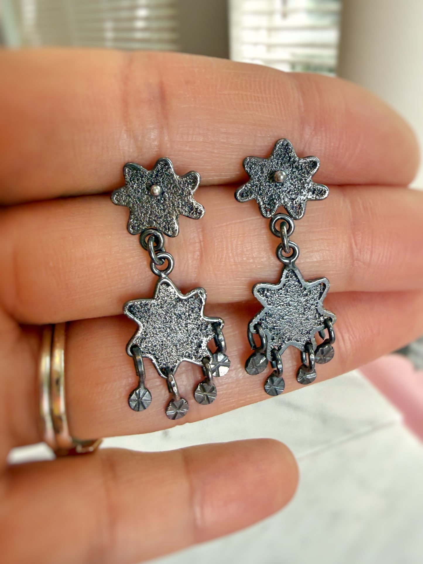 Dark Textured Star Chandelier Earrings
