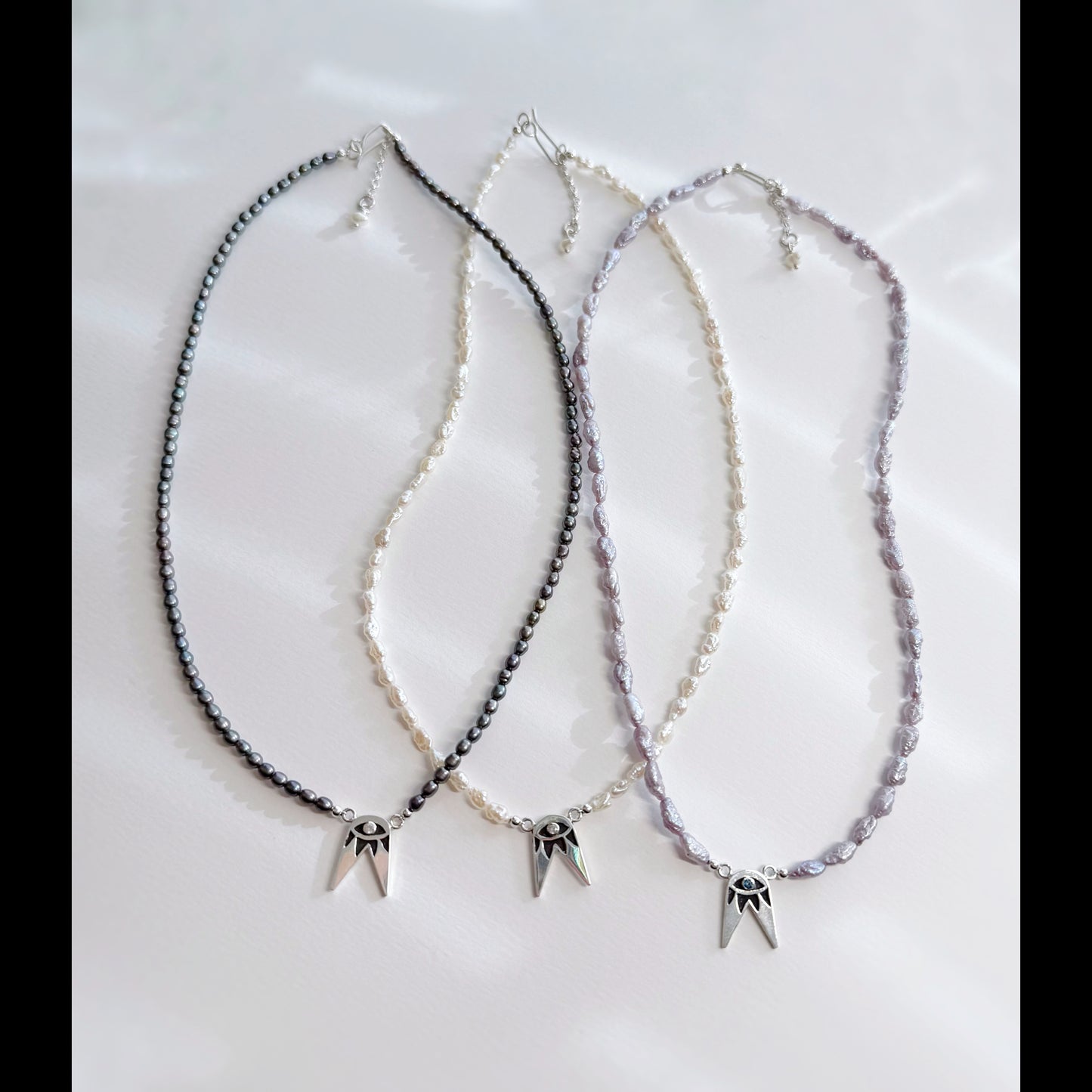 Woodpecker Forked Eye White Sapphire & Pearl