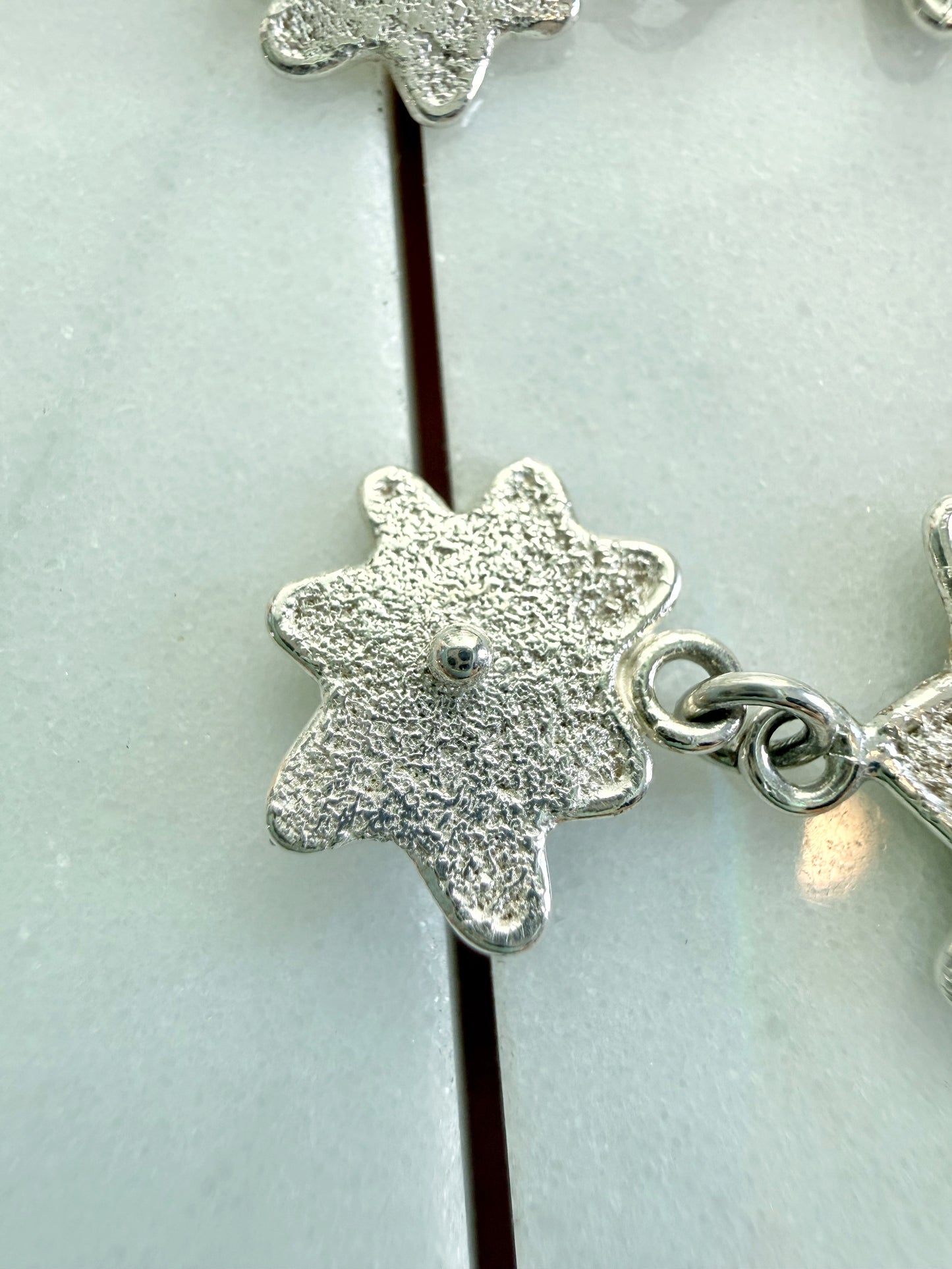 Textured Star Chandelier Earrings