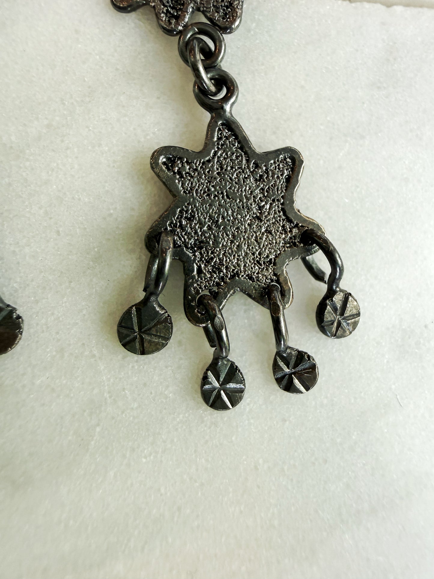 Dark Textured Star Chandelier Earrings