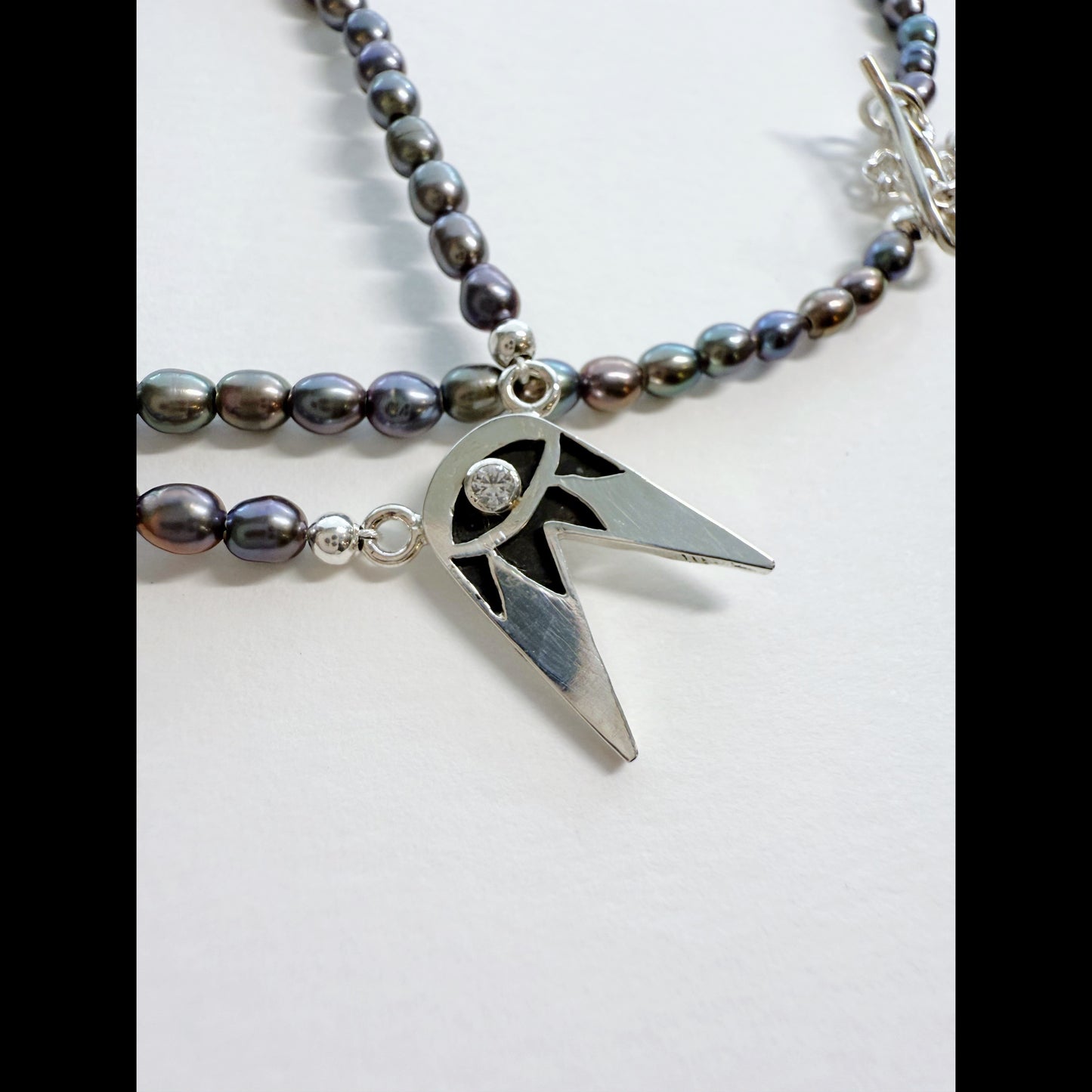 Woodpecker Forked Eye White Sapphire & Pearl